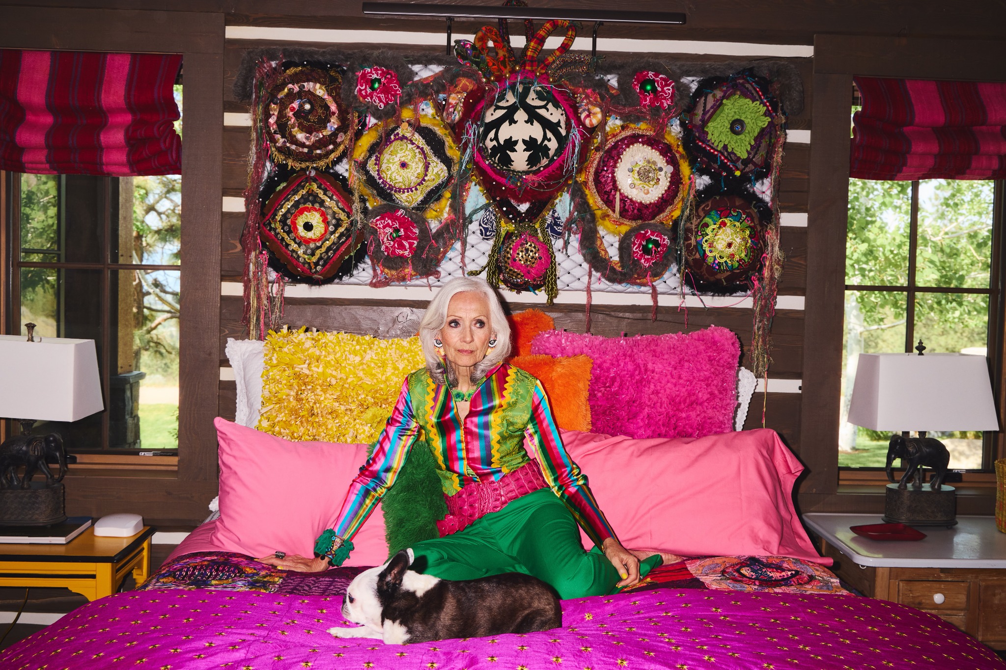 Elena Agostinis at home with her jewelry and dog — photograph by Stephan Alessi